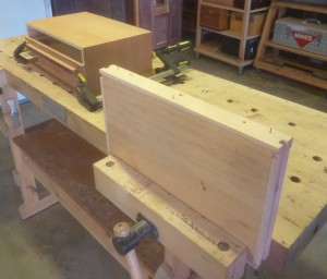 That's the top drawer in the foreground clamped in the vise, you can see the cut off nails.